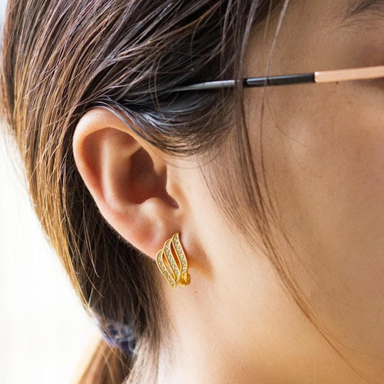 Gold Plated Triple Row Clip On Earrings Created with Zircondia® Crystals - Philip Jones Jewellery