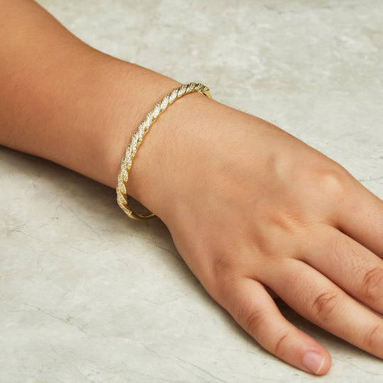 Gold Plated Twist Bangle Created with Zircondia® Crystals (7 Inch) - Philip Jones Jewellery