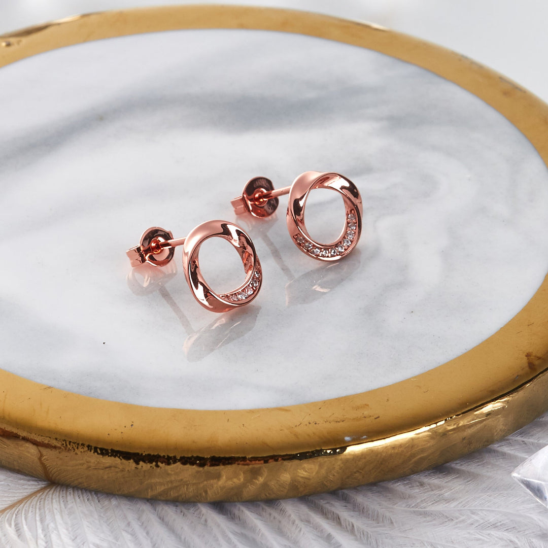 Rose Gold Plated Circle Twist Earrings Created with Zircondia® Crystals - Philip Jones Jewellery