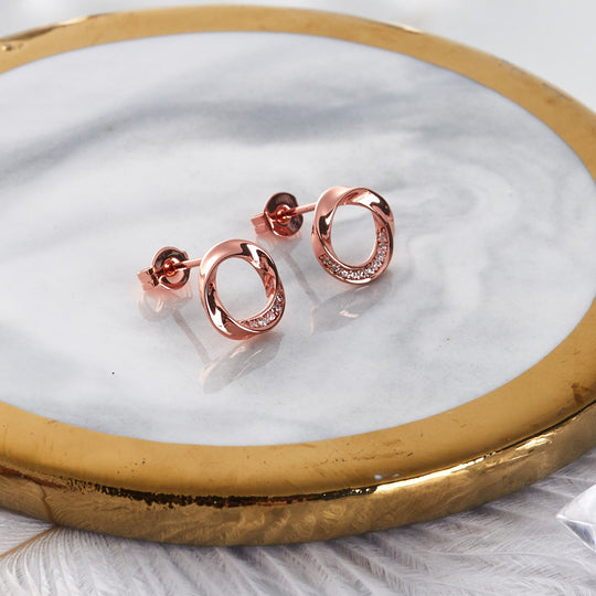 Rose Gold Plated Circle Twist Earrings Created with Zircondia® Crystals - Philip Jones Jewellery