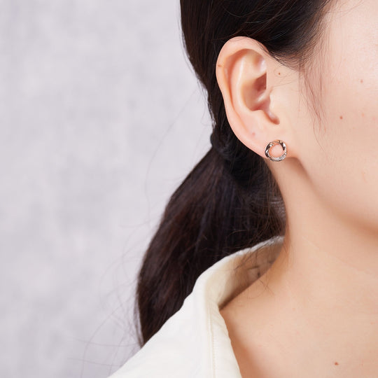 Rose Gold Plated Circle Twist Earrings Created with Zircondia® Crystals - Philip Jones Jewellery