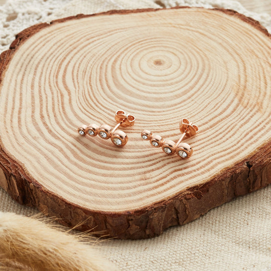 Rose Gold Plated Four Stone Climber Earrings Created With Zircondia® Crystals - Philip Jones Jewellery
