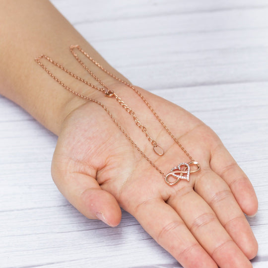 Rose Gold Plated Infinity Heart Necklace Created with Zircondia® Crystals - Philip Jones Jewellery