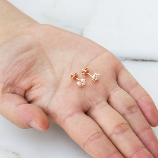 Rose Gold Plated Star Earrings Created with Zircondia® Crystals - Philip Jones Jewellery