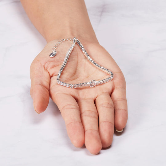 Round Solitaire Tennis Bracelet Created with Zircondia® Crystals - Philip Jones Jewellery