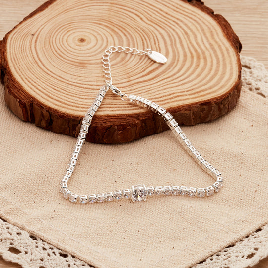 Round Solitaire Tennis Bracelet Created with Zircondia® Crystals - Philip Jones Jewellery