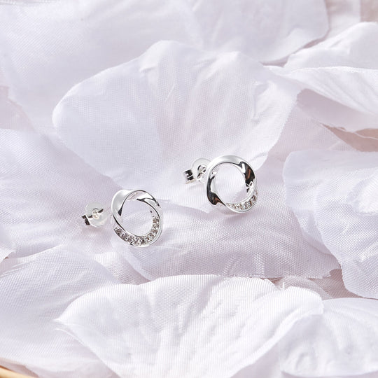 Silver Plated Circle Twist Earrings Created with Zircondia® Crystals - Philip Jones Jewellery