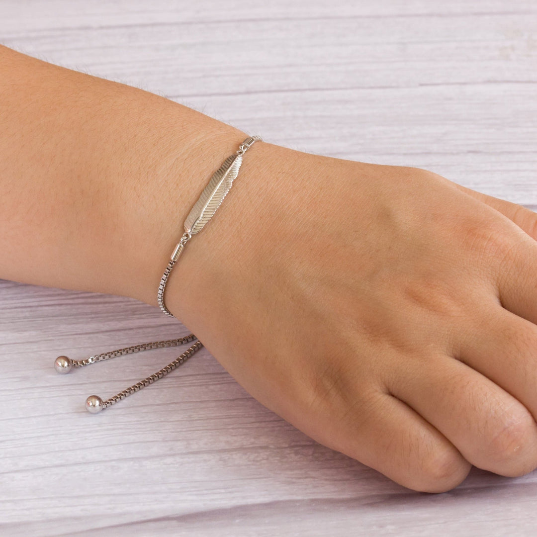 Silver Plated Feather Friendship Bracelet Created with Zircondia® Crystals - Philip Jones Jewellery