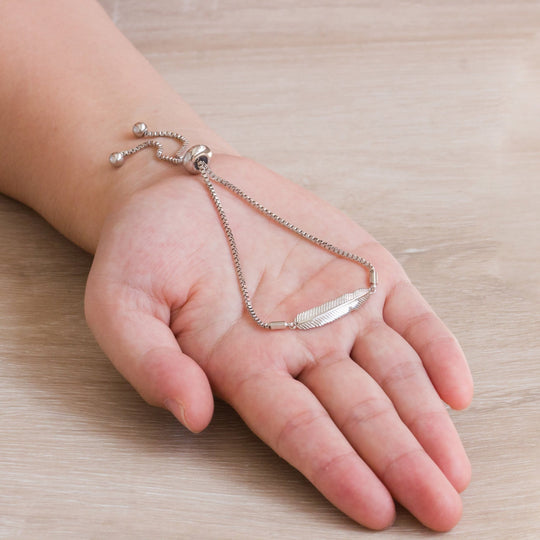 Silver Plated Feather Friendship Bracelet Created with Zircondia® Crystals - Philip Jones Jewellery