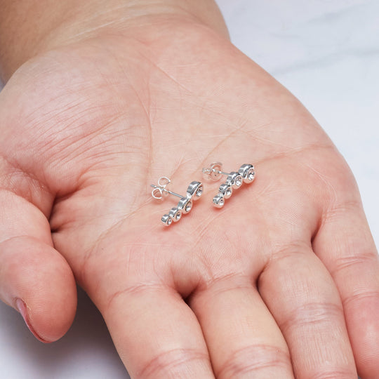 Silver Plated Four Stone Climber Earrings Created With Zircondia® Crystals - Philip Jones Jewellery