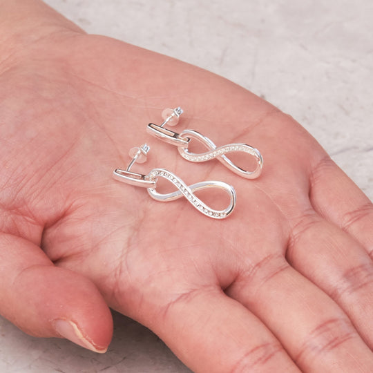 Silver Plated Infinity Drop Earrings Created with Zircondia® Crystals - Philip Jones Jewellery