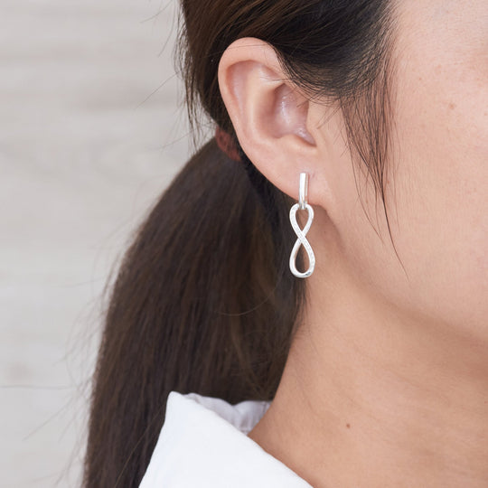 Silver Plated Infinity Drop Earrings Created with Zircondia® Crystals - Philip Jones Jewellery