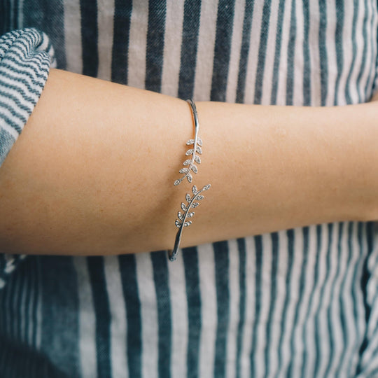 Silver Plated Leaf Bangle Created with Zircondia® Crystals - Philip Jones Jewellery
