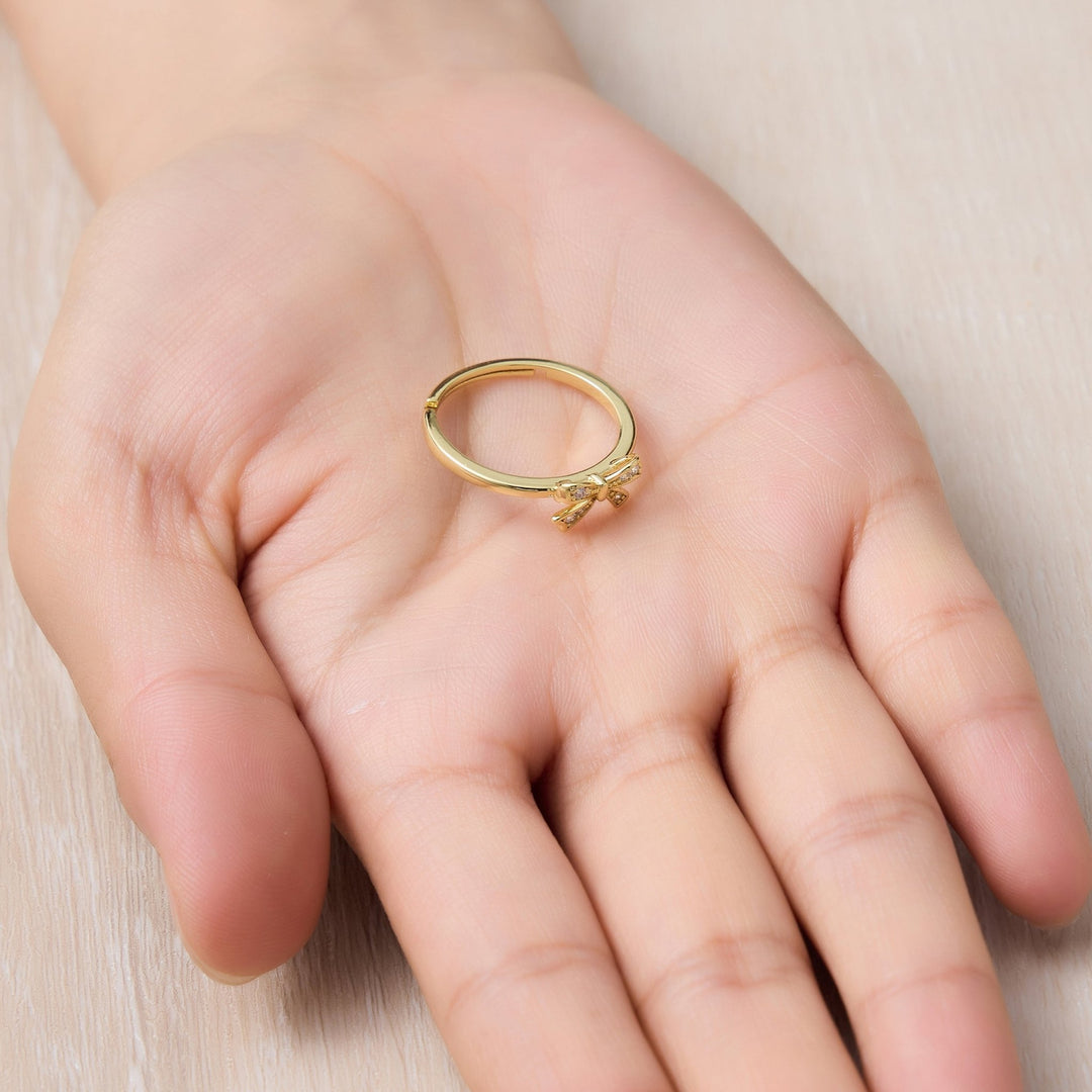 18k Gold Plated Bow Adjustable Ring Created with Zircondia® Crystals - Philip Jones Jewellery