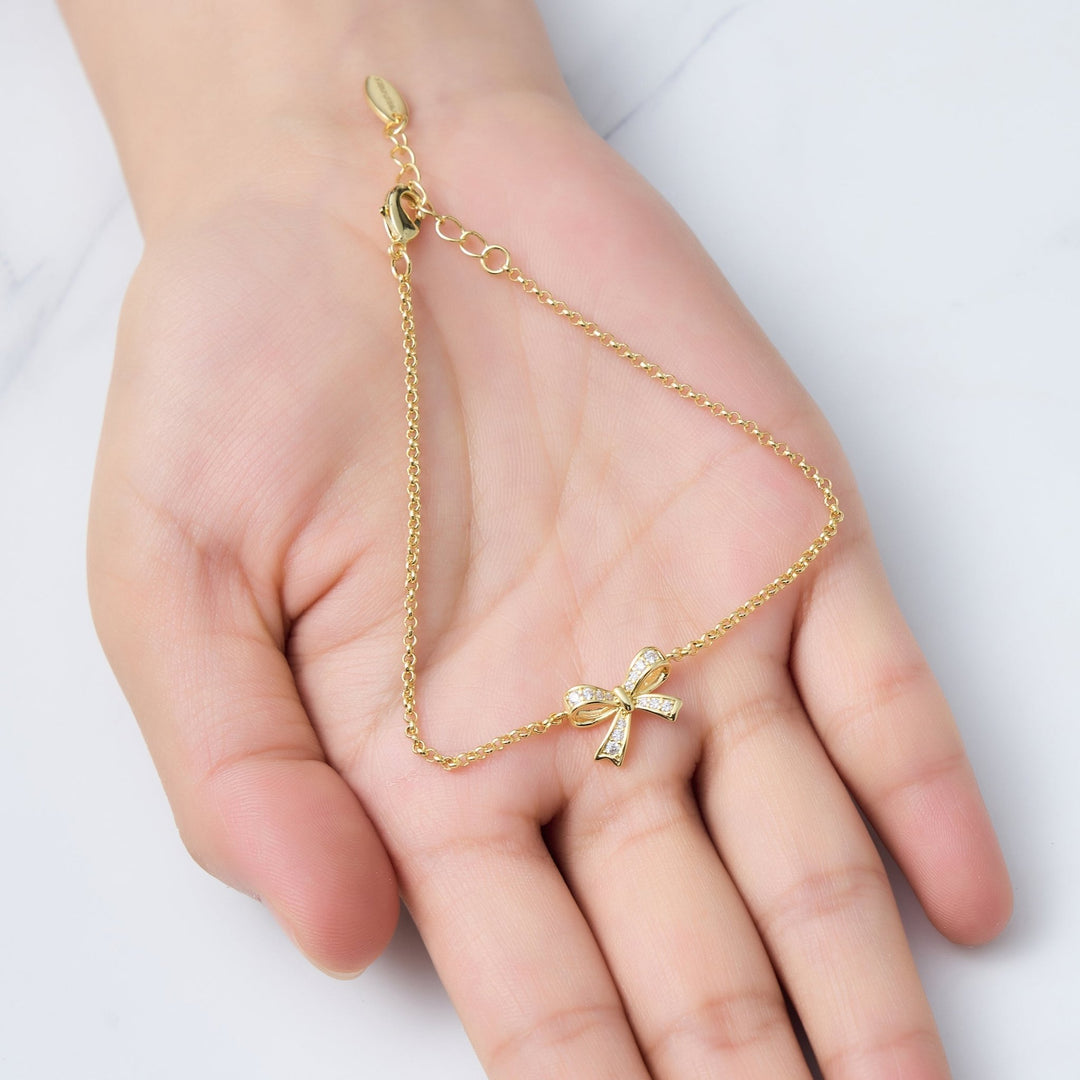 18k Gold Plated Bow Bracelet Created with Zircondia® Crystals - Philip Jones Jewellery
