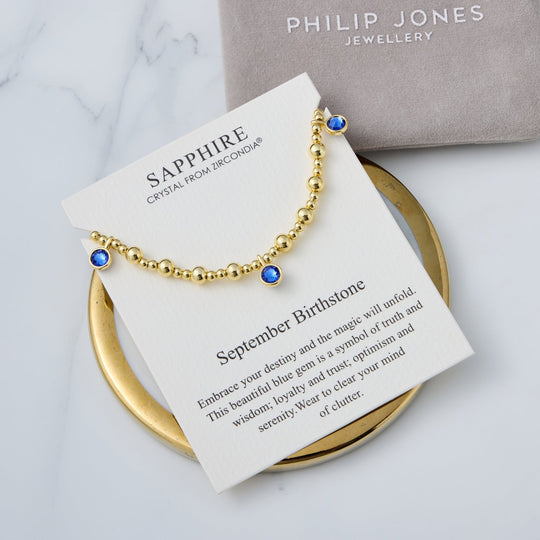 18k Gold Plated September (Sapphire) Birthstone Stretch Charm Bracelet with Quote Card - Philip Jones Jewellery