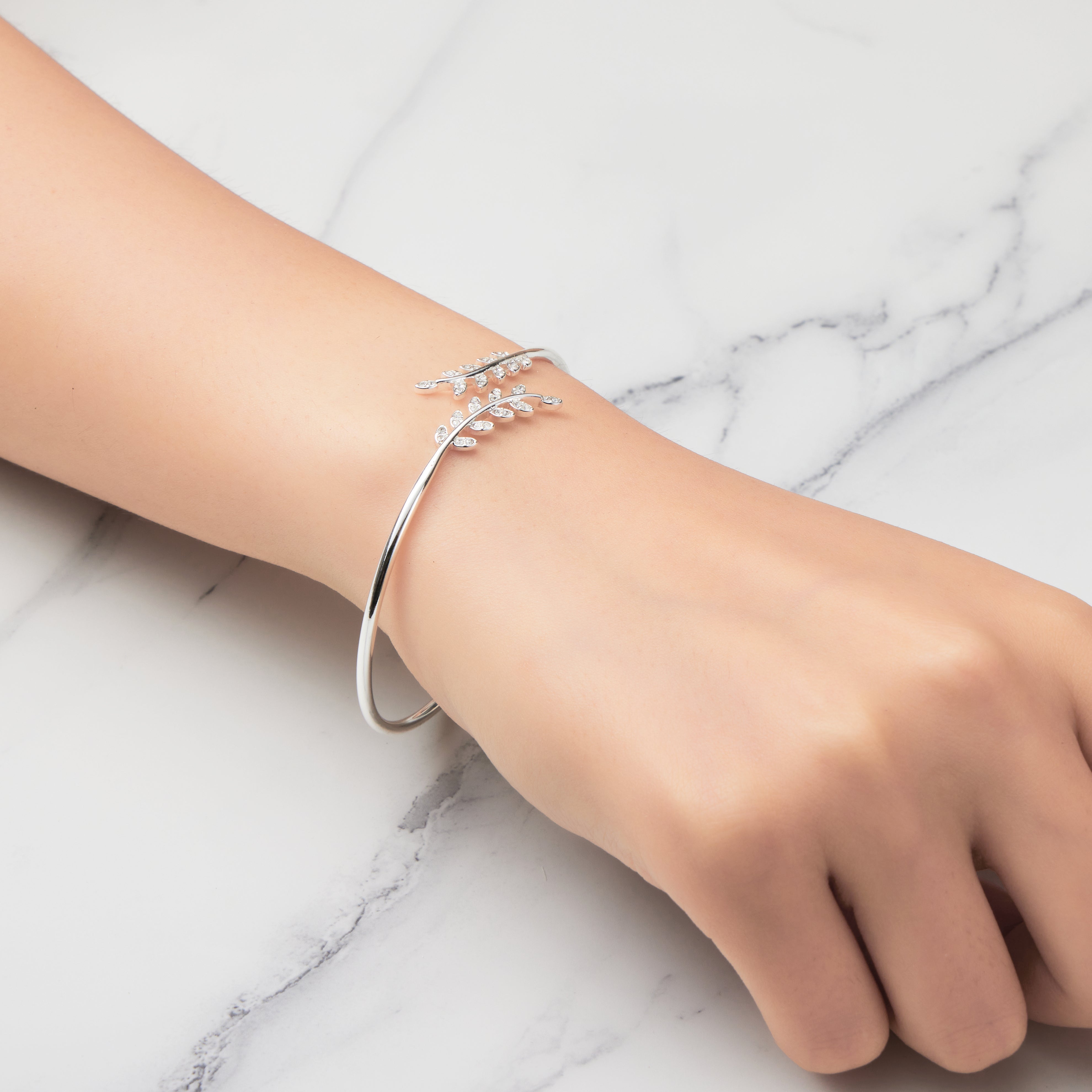 Silver Plated Leaf Bangle Created with Zircondia® Crystals