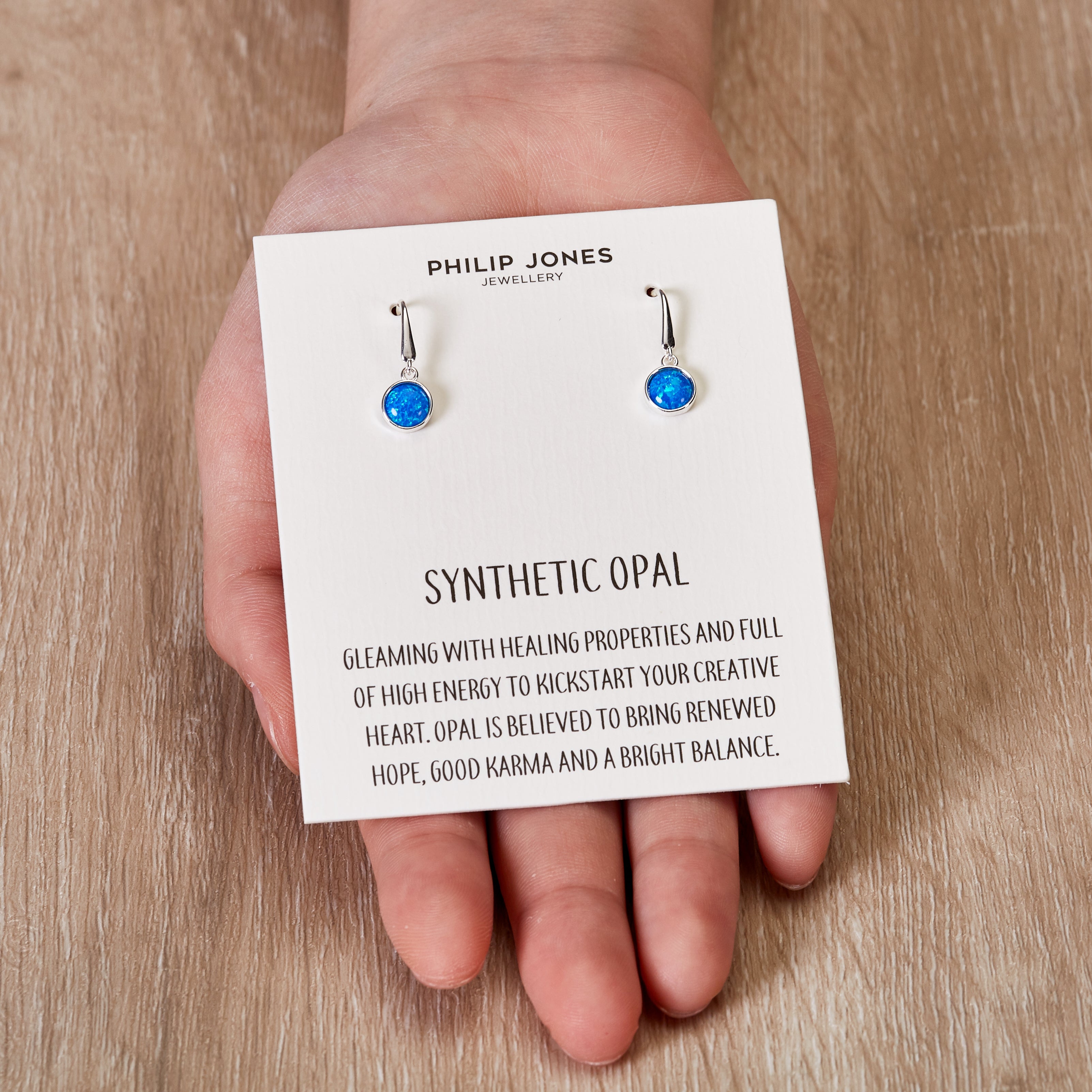 Blue Australian Opal stud earrings in 18k Gold