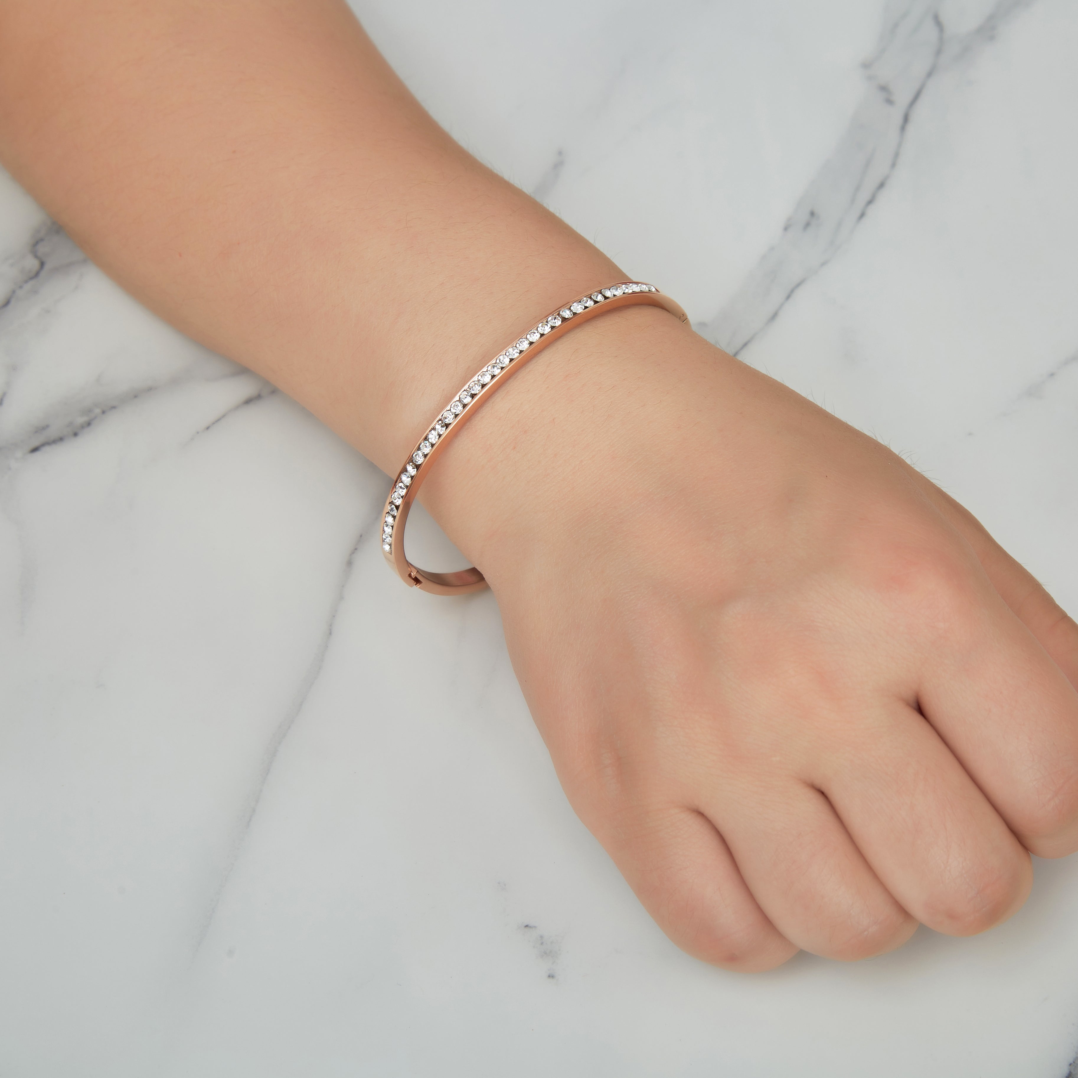 Rose Gold Plated Channel Set Bangle Created with Zircondia® Crystals