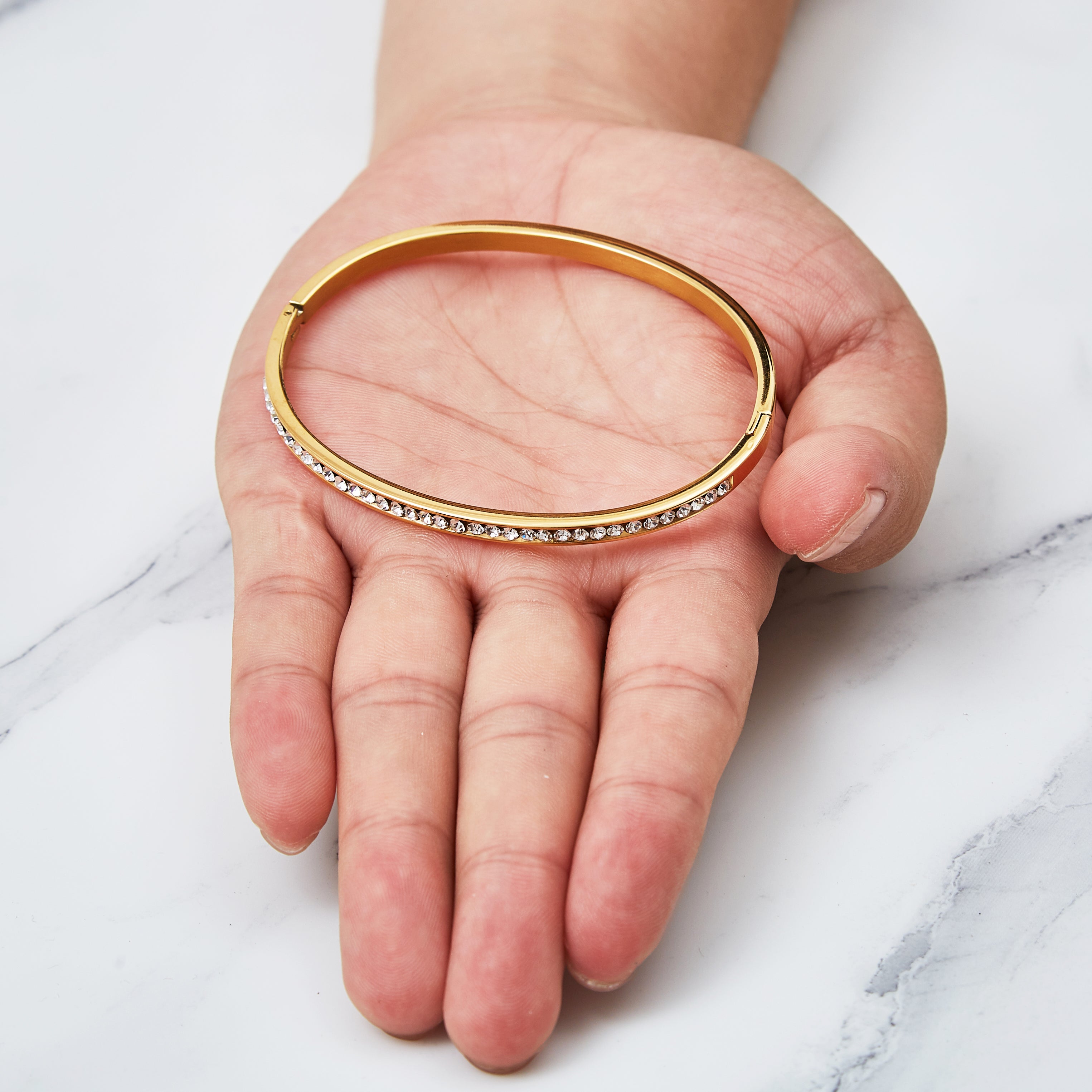Gold Plated Channel Set Bangle Created with Zircondia® Crystals
