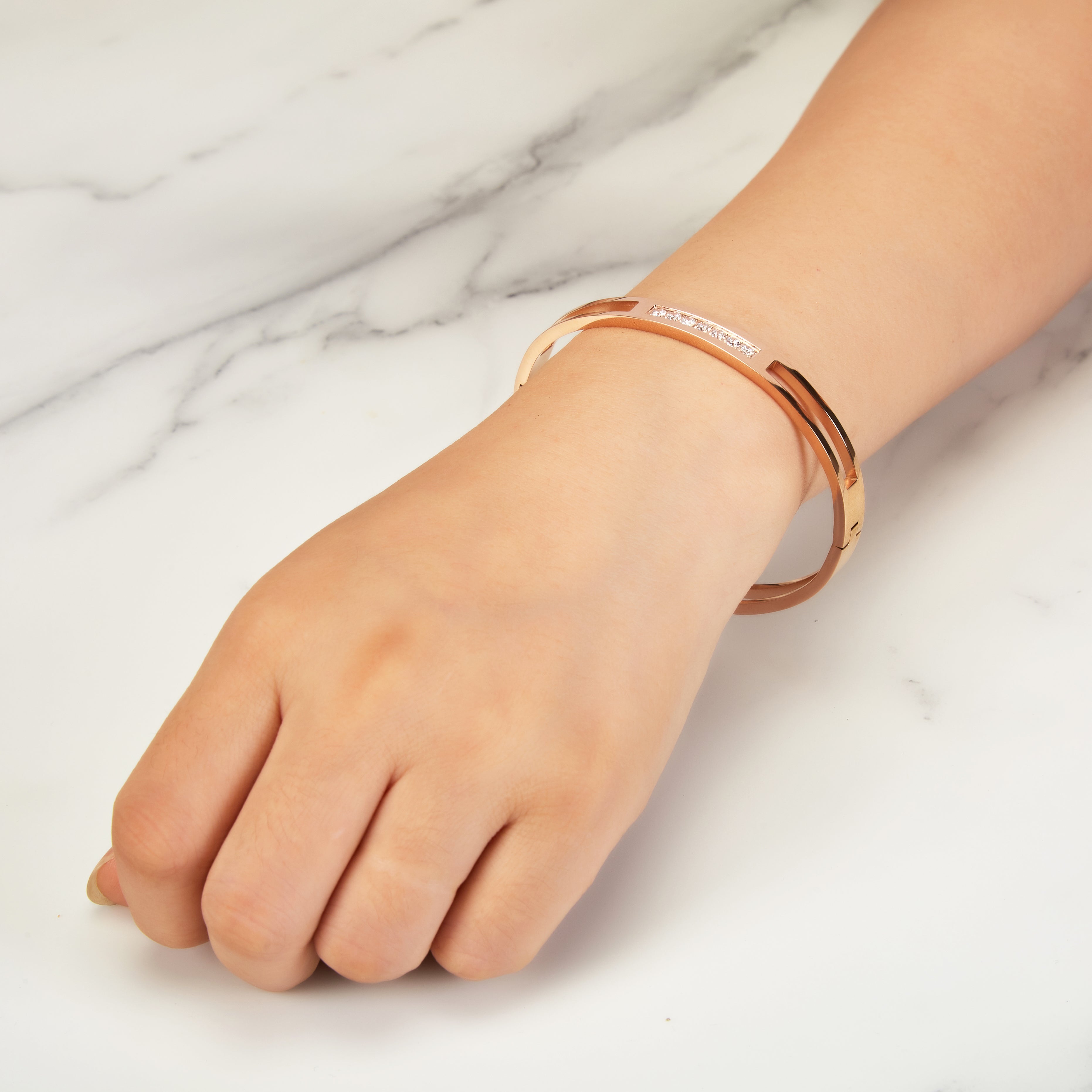 Rose Gold Plated Stainless Steel Channel Bangle Created with Zircondia® Crystals