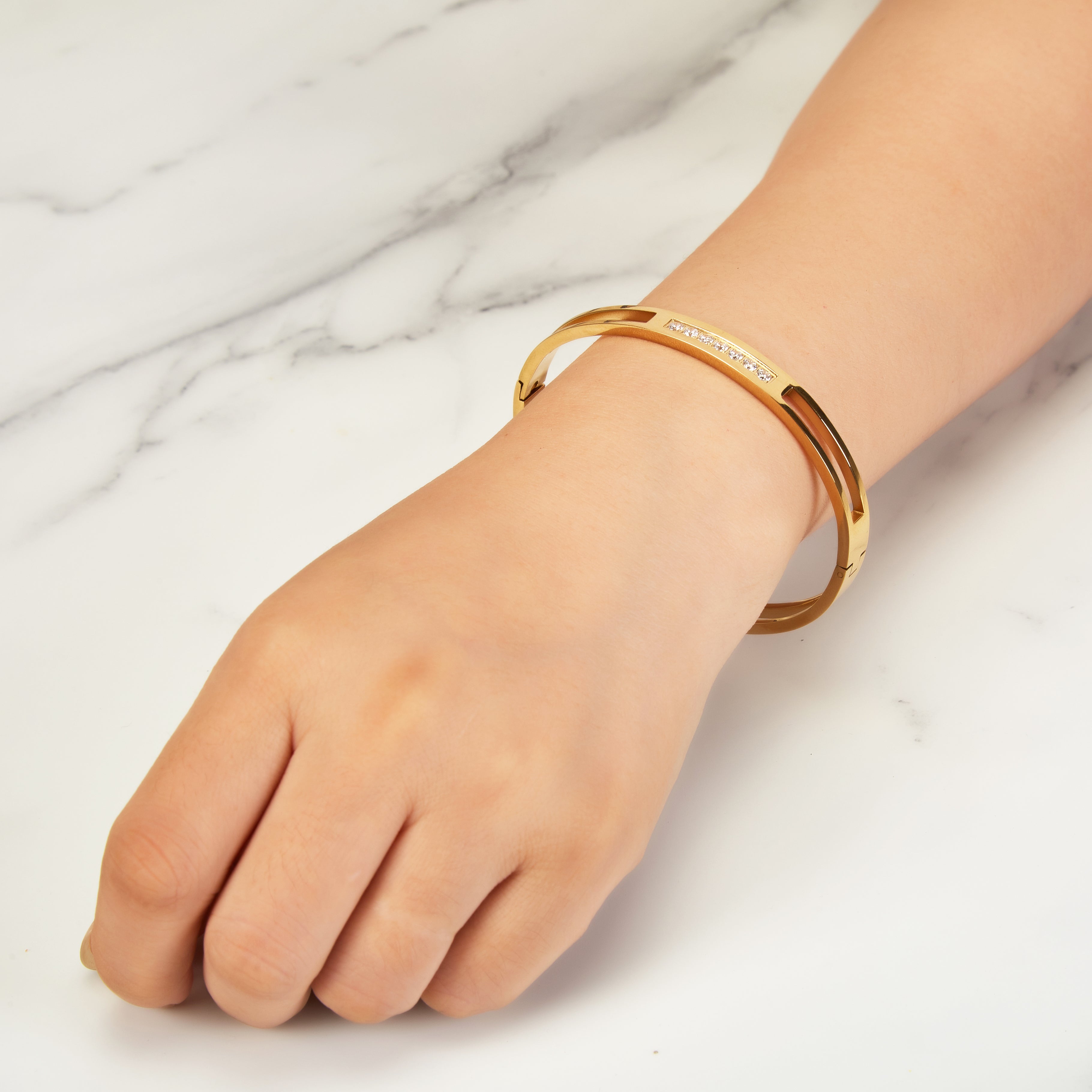 Gold Plated Stainless Steel Channel Bangle Created with Zircondia® Crystals