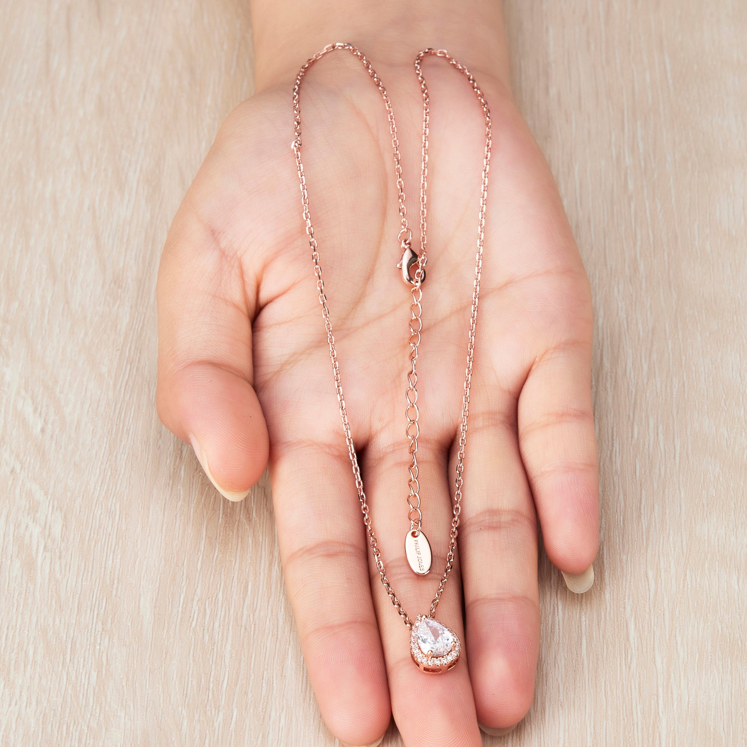 Rose Gold Plated Pear Halo Necklace Created with Zircondia® Crystals