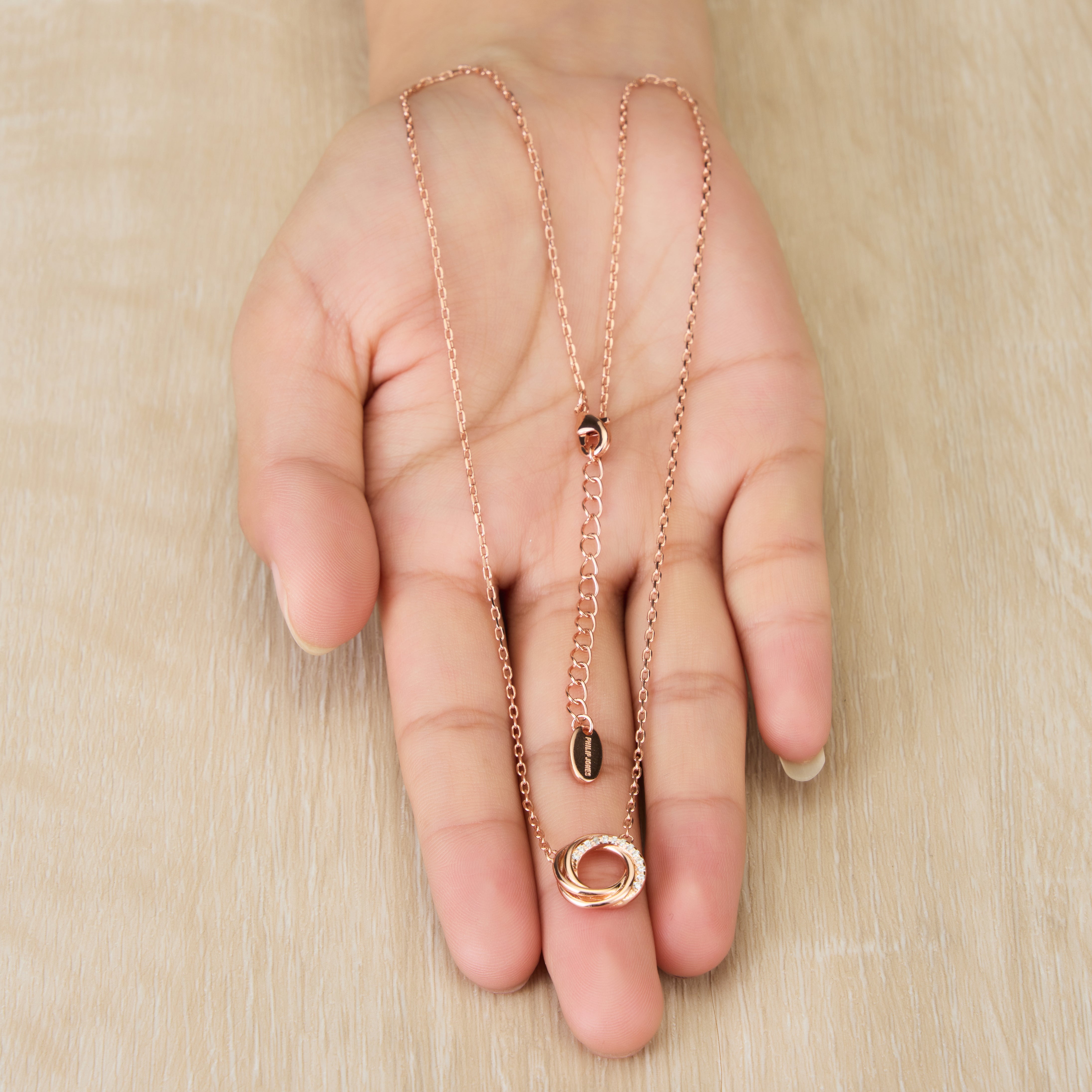 Rose Gold Plated Circle Knot Necklace Created with Zircondia® Crystals