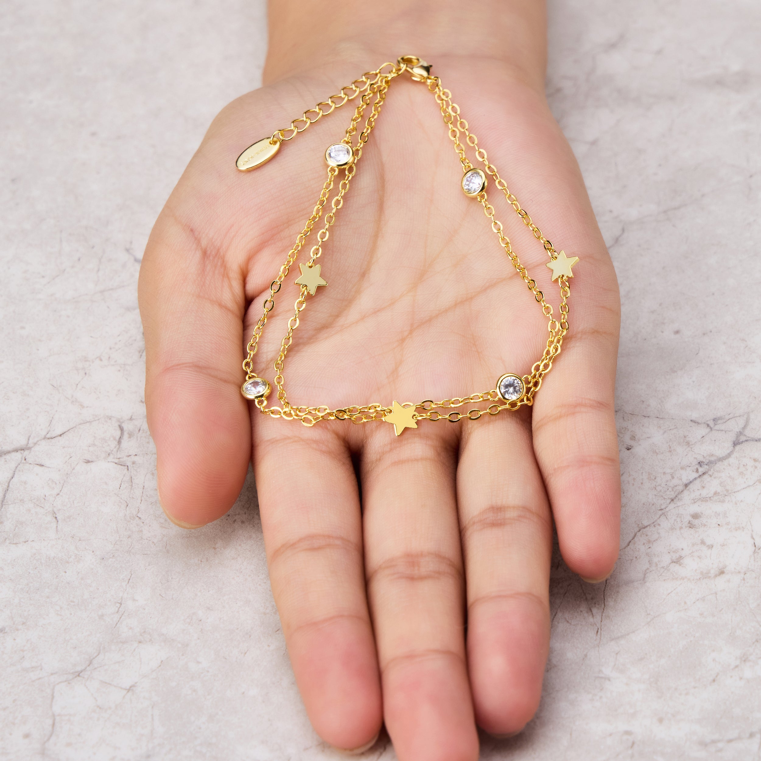 Gold Plated Layered Star Anklet Created with Zircondia® Crystals