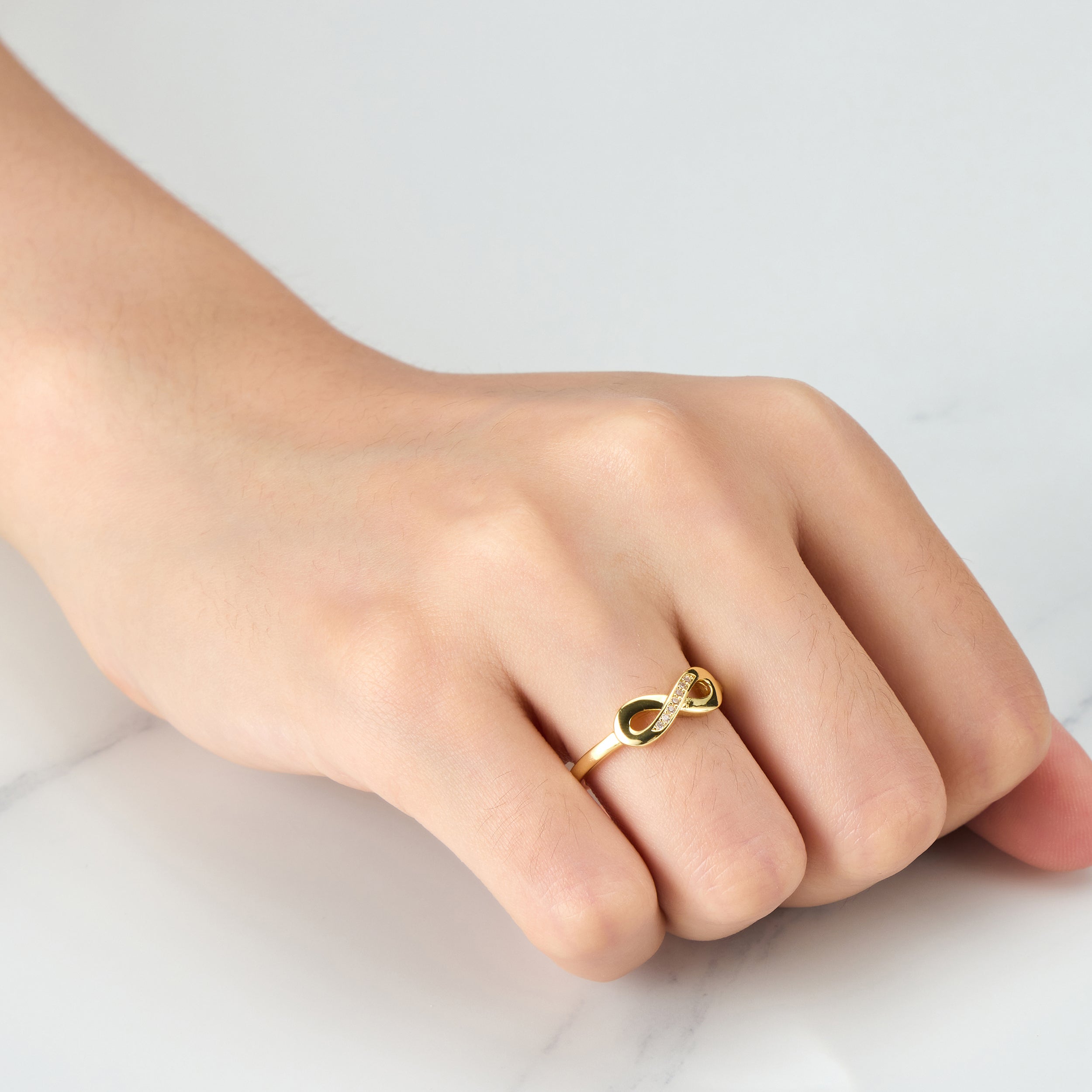 Gold Plated Infinity Ring Created with Zircondia® Crystals