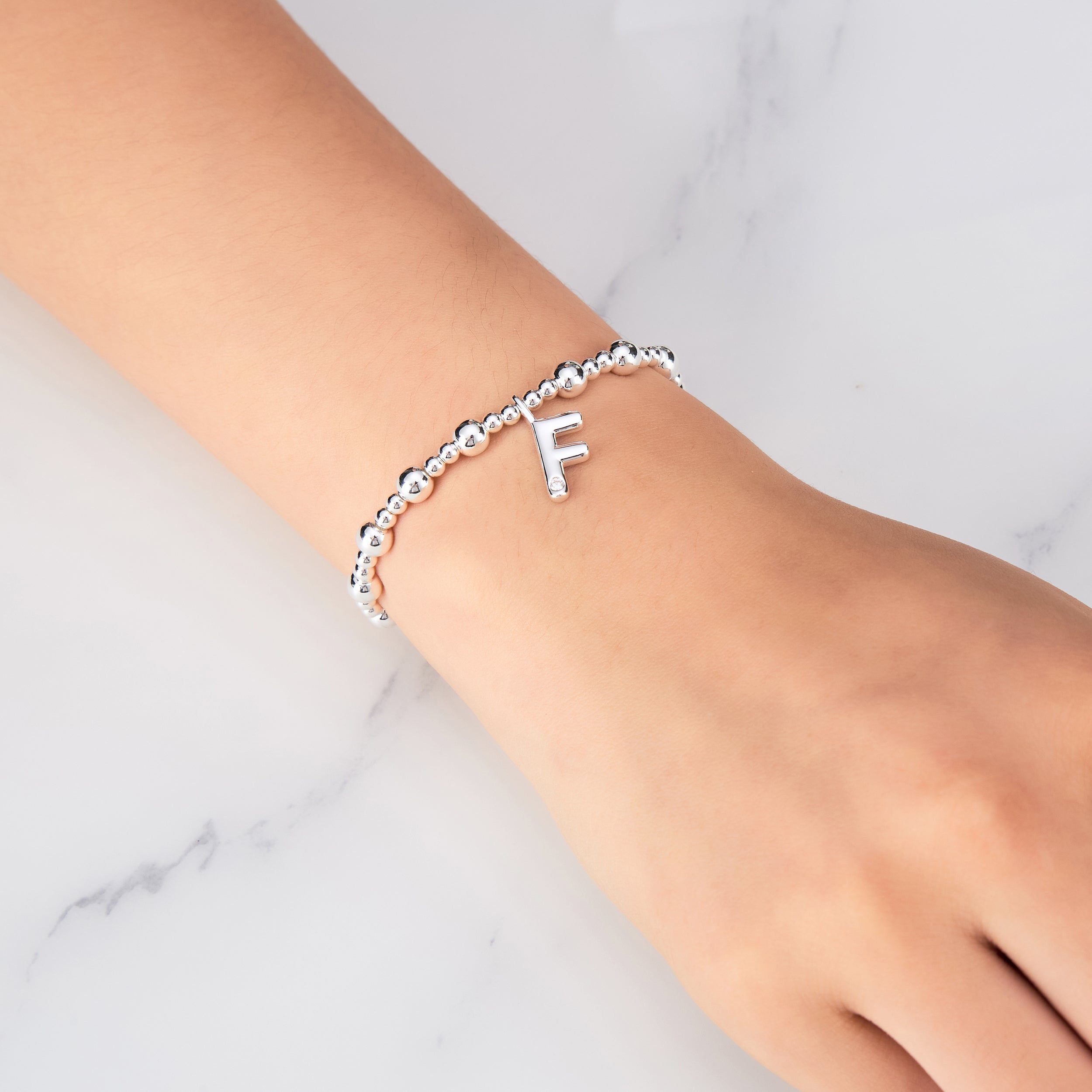 Letter F Initial Stretch Bracelet Created with Zircondia® Crystals