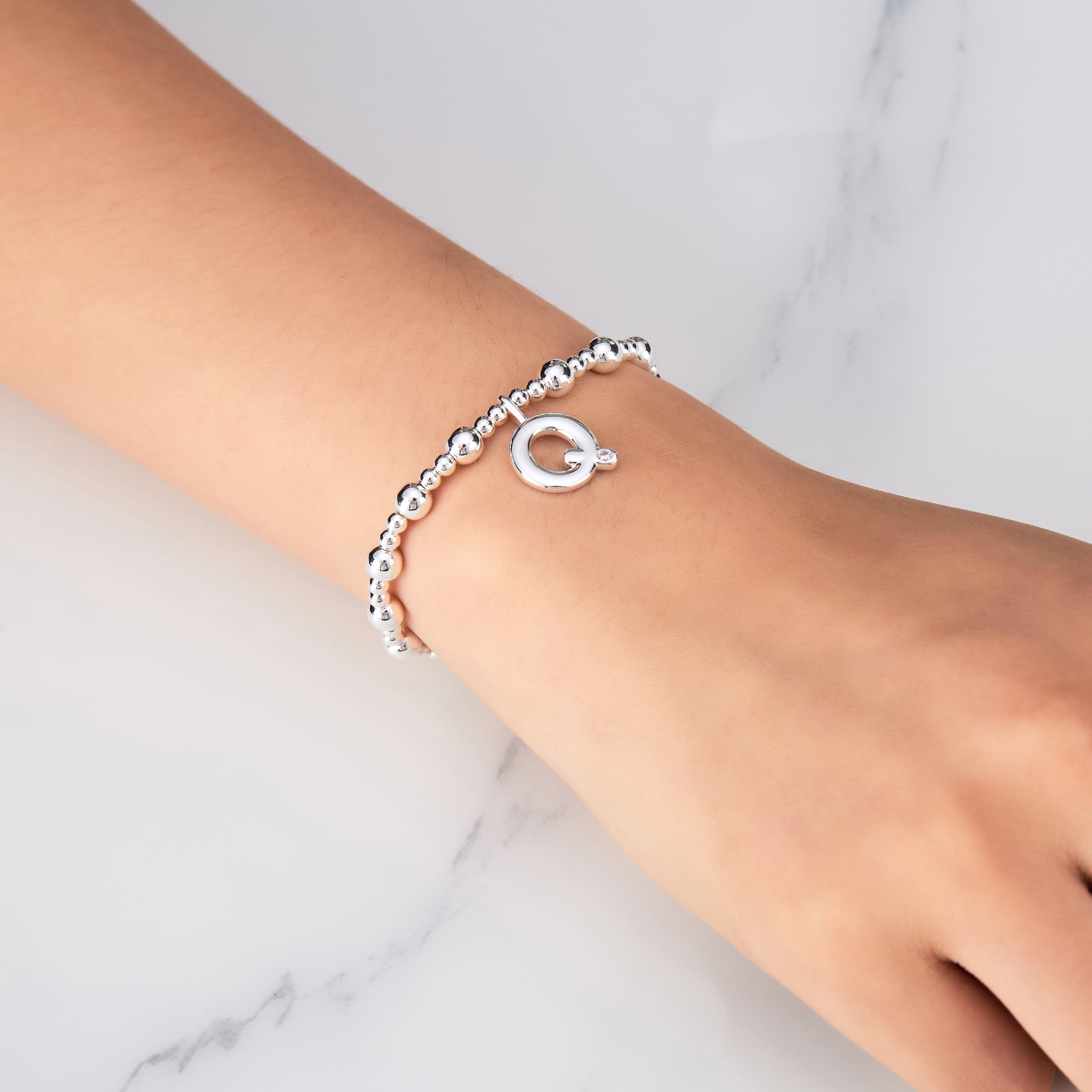 Letter Q Initial Stretch Bracelet Created with Zircondia® Crystals