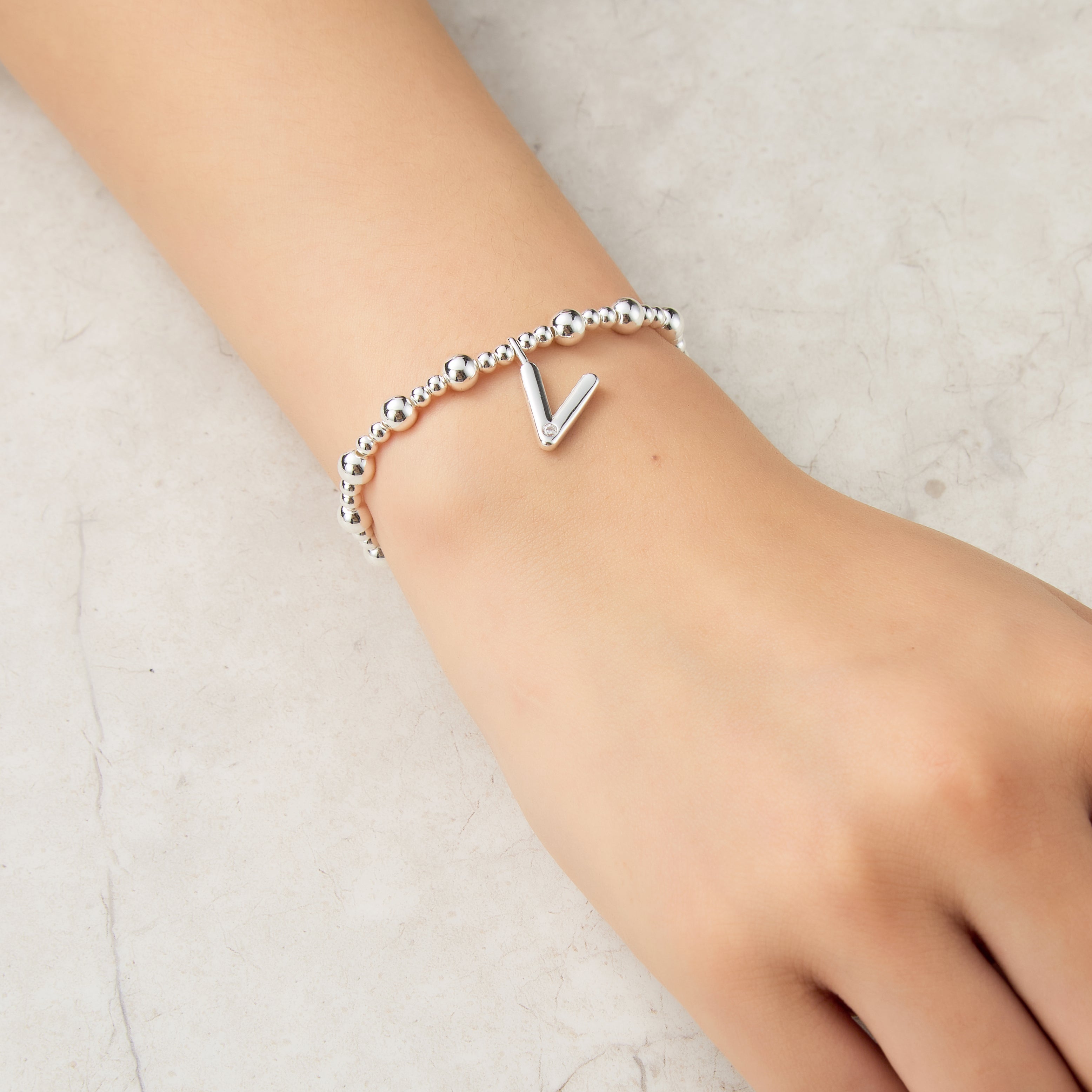 Letter V Initial Stretch Bracelet Created with Zircondia® Crystals