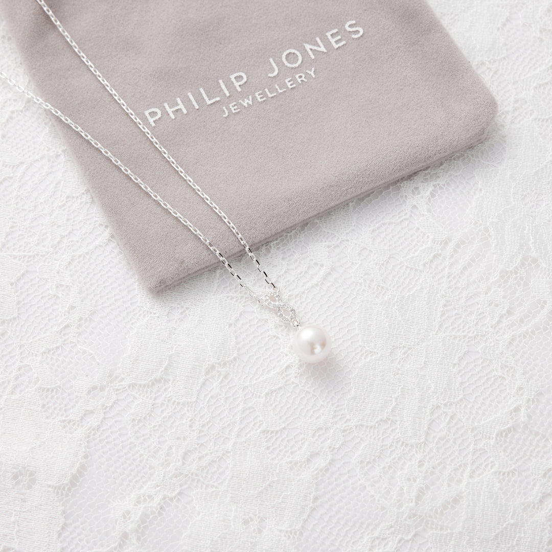 Silver Plated Infinity Pearl Drop Bridal Necklace Created with Zircondia® Crystals