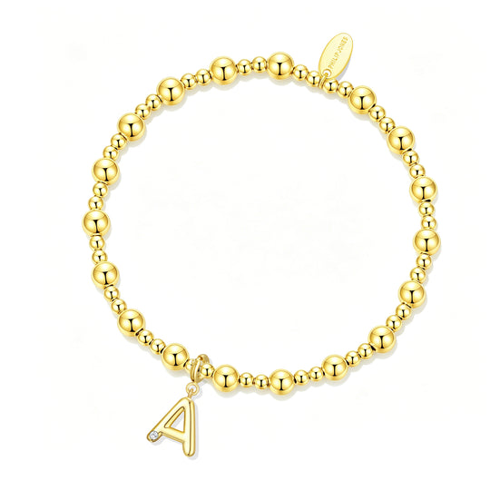 Customisable 18k Gold Plated Beaded Stretch Bracelet (A-Z) with Option of Initial Charm Lifestyle Images by Philip Jones
