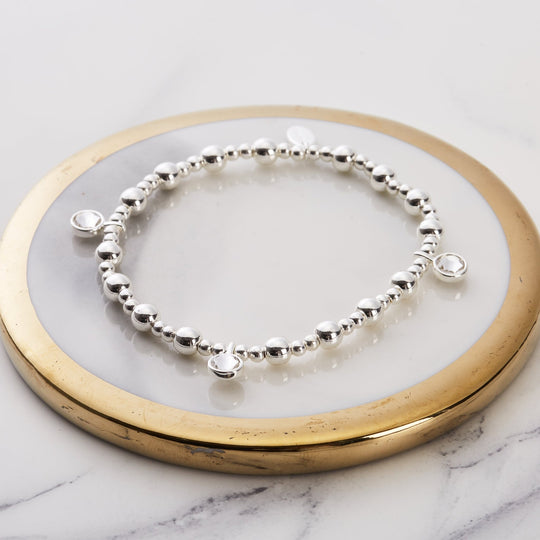 April (Diamond) Birthstone Stretch Charm Bracelet with Quote Gift Box - Philip Jones Jewellery