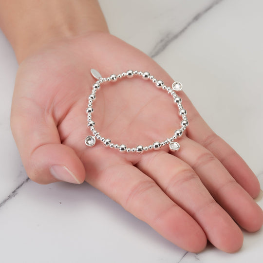 April (Diamond) Birthstone Stretch Charm Bracelet with Quote Gift Box - Philip Jones Jewellery