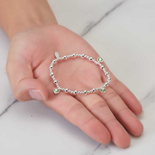 August (Peridot) Birthstone Stretch Charm Bracelet with Quote Gift Box - Philip Jones Jewellery