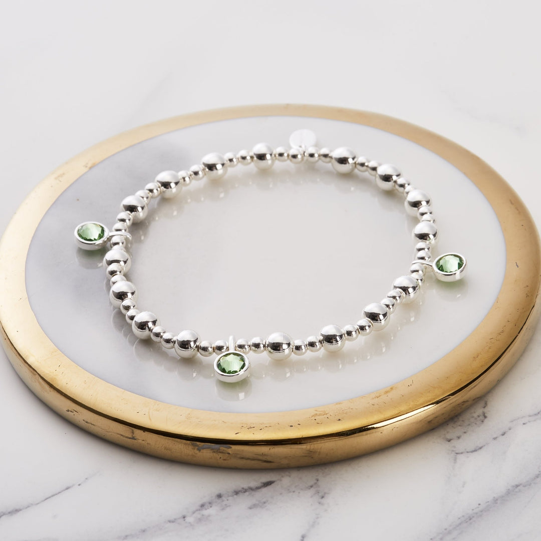August (Peridot) Birthstone Stretch Charm Bracelet with Quote Gift Box - Philip Jones Jewellery