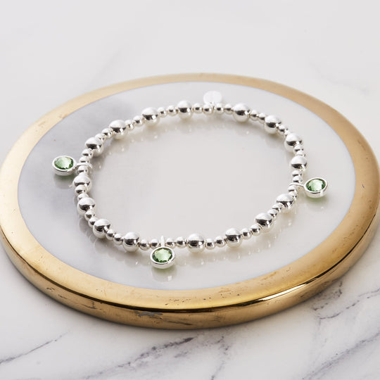August (Peridot) Birthstone Stretch Charm Bracelet with Quote Gift Box - Philip Jones Jewellery