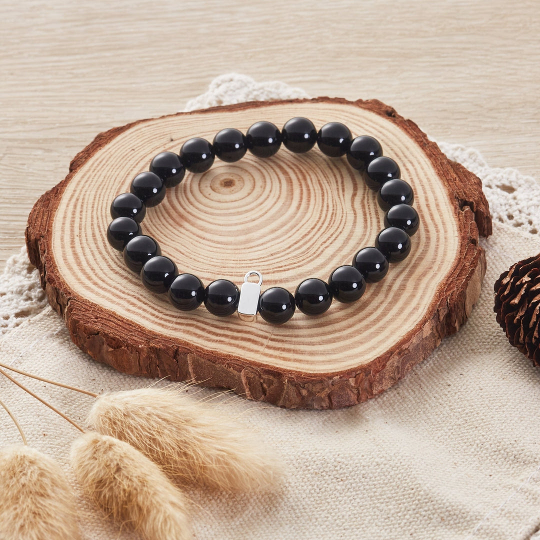 Black Onyx Gemstone Stretch Bracelet with Charm Created with Zircondia® Crystals - Philip Jones Jewellery