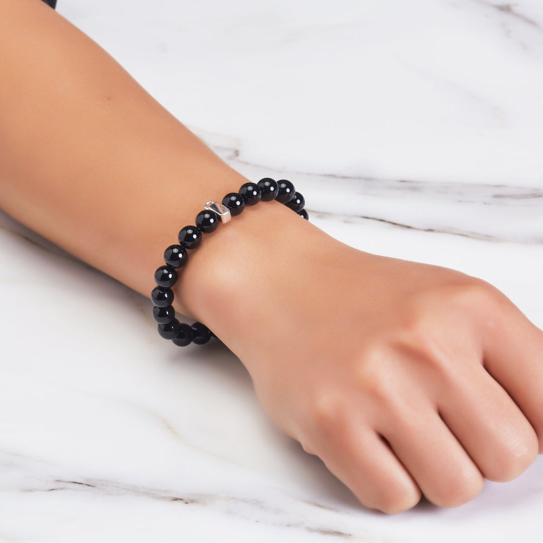 Black Onyx Gemstone Stretch Bracelet with Charm Created with Zircondia® Crystals - Philip Jones Jewellery