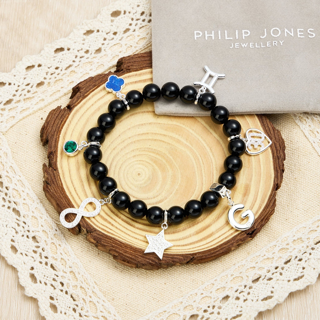 Black Onyx Gemstone Stretch Bracelet with Option of Charms - Philip Jones Jewellery