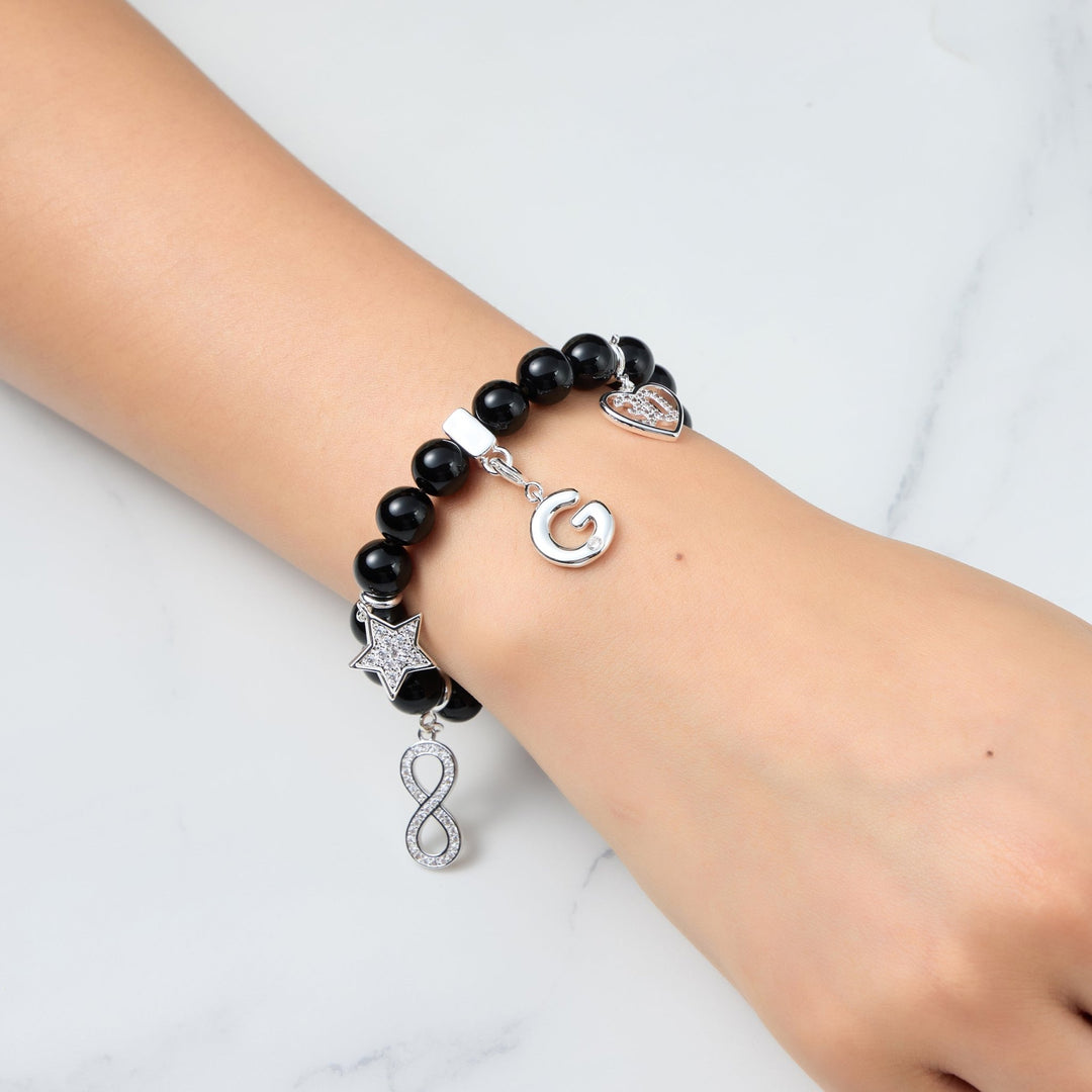 Black Onyx Gemstone Stretch Bracelet with Option of Charms - Philip Jones Jewellery