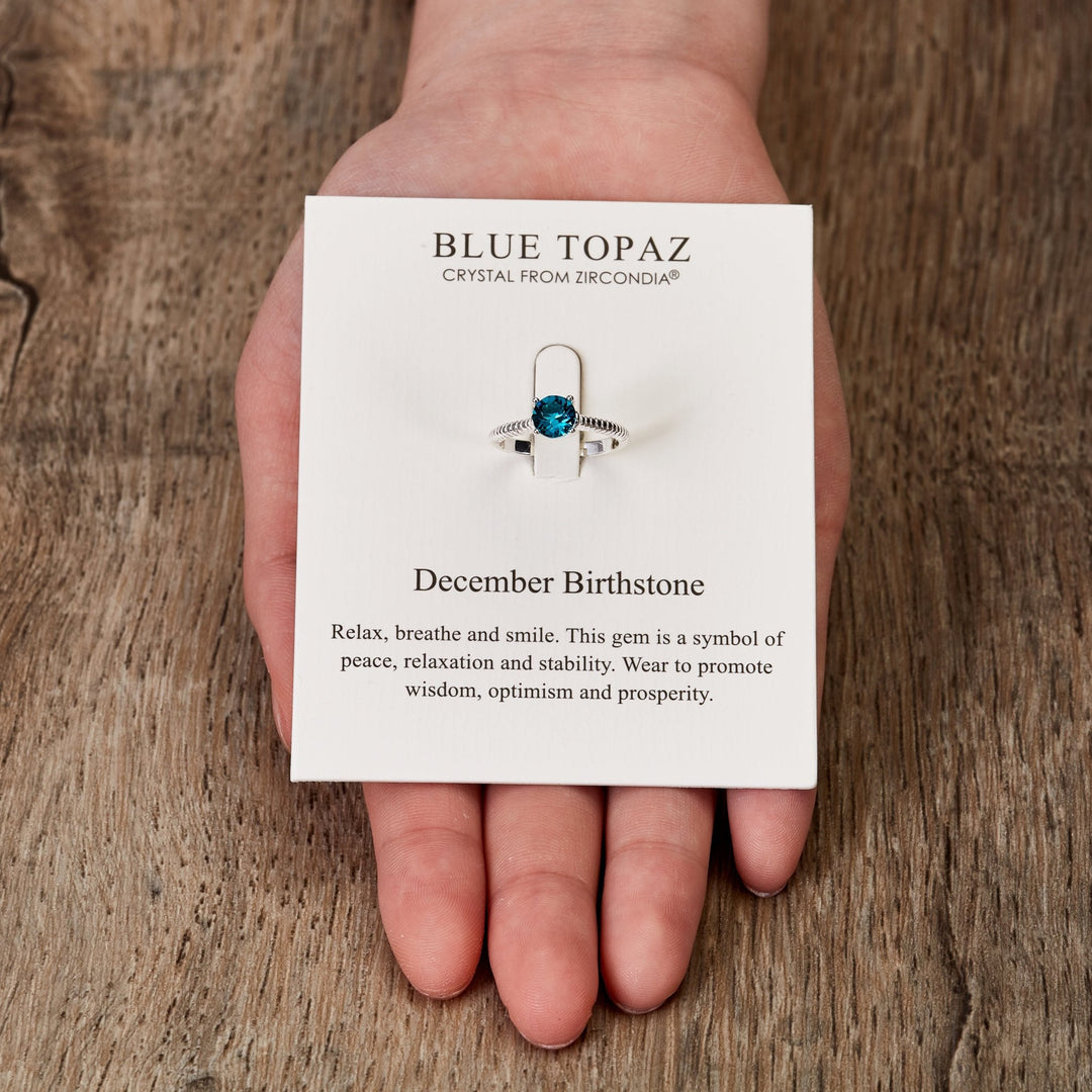 December (Blue Topaz) Adjustable Birthstone Ring Created with Zircondia® Crystals - Philip Jones Jewellery