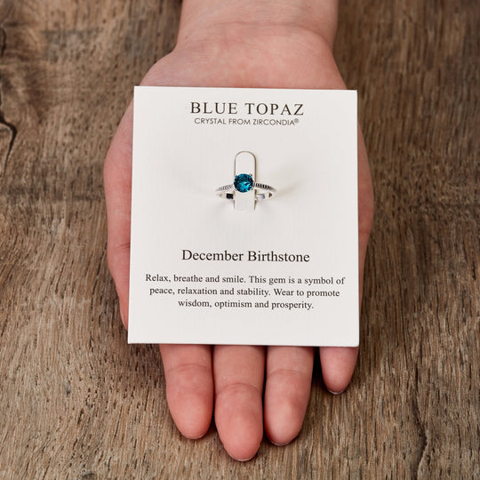 December (Blue Topaz) Adjustable Birthstone Ring Created with Zircondia® Crystals - Philip Jones Jewellery