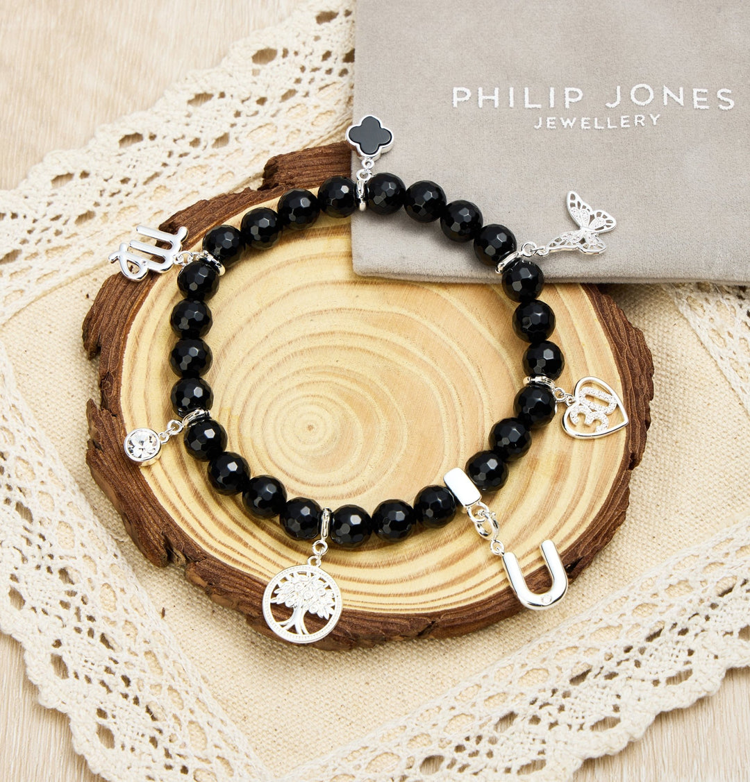 Faceted Black Onyx Gemstone Stretch Bracelet with Option of Charms - Philip Jones Jewellery