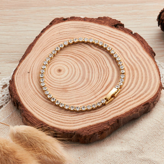 18k Gold Plated 3mm Bridal Tennis Bracelet Created with Zircondia® Crystals Lifestyle Images by Philip Jones