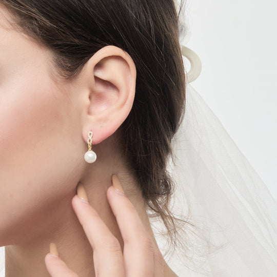 Gold Plated Infinity Pearl Drop Bridal Earrings Created with Zircondia® Crystals - Philip Jones Jewellery