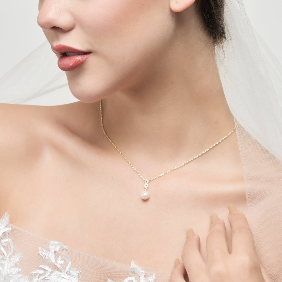 Gold Plated Infinity Pearl Drop Bridal Necklace Created with Zircondia® Crystals - Philip Jones Jewellery
